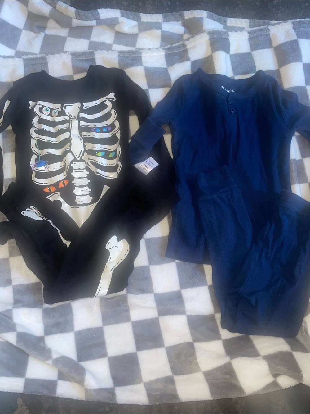 Long sleeve pj set size 4T. Skelton set and Navy set.